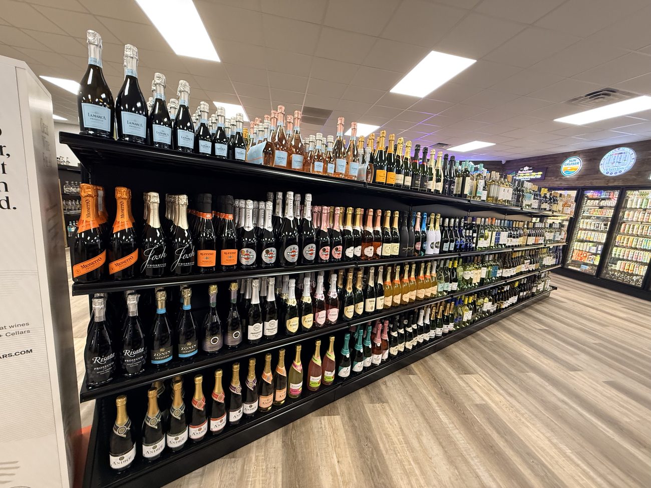 Sparkling wine and champagne shelf at Oak & Barrel Liquors