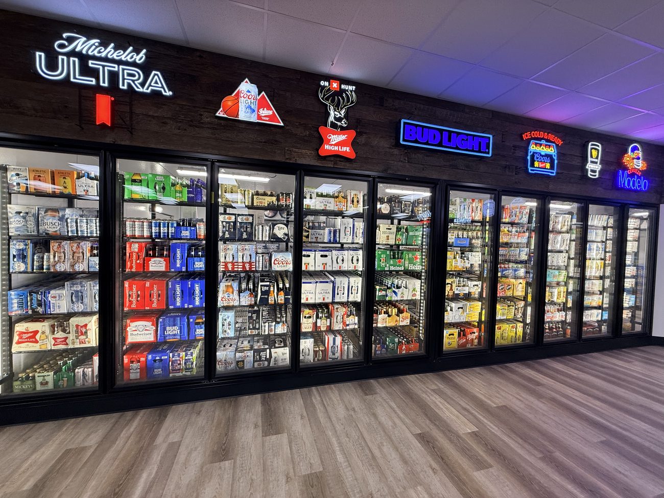 Beer cooler wall at Oak & Barrel Liquors