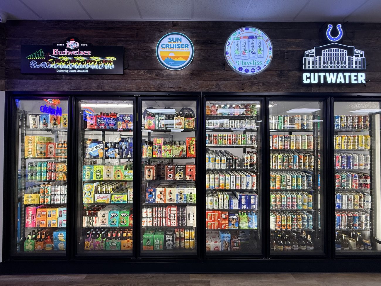 Craft beer cooler section at Oak & Barrel Liquors